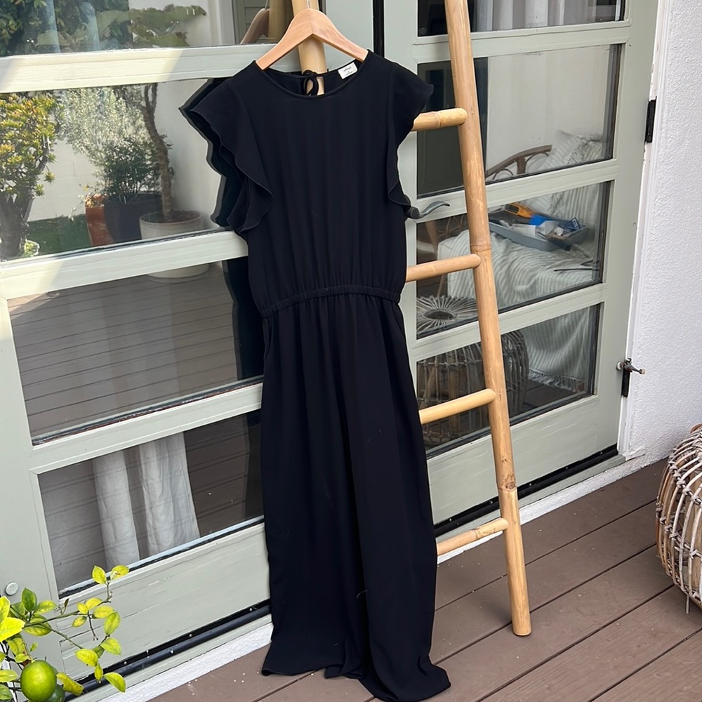 Black jumpsuit with somewhat open back